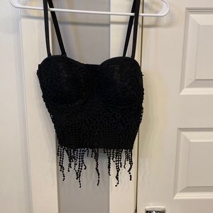 Black lace bustier with fringe